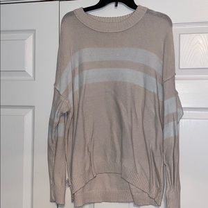 Light sweater with stripes. Worn once